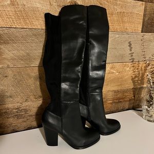 Knee high heeled boots